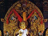 Tibet Lhasa 04 06 Potala Padmasambhava Close Up The Preceptor Chapel is dedicated to eight Indian teachers who brought various tantric practices and rituals to Tibet. The central figure is a silver statue of Padmasambhava (Guru Rinpoche), backed by an elaborate halo and topped with a finely worked garuda.